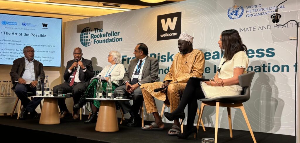 From left: Dr David Farrell, Dr. Ibrahima Sy, Dr Agnes Soares da Silva, Dr Anban Pillay, and Dr Ousmane Ndiaye discuss climate and health during a panel discussion with a journalist-moderator.