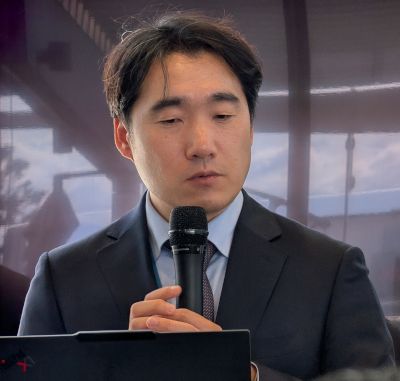 WHO's Dr Hong Jang addresses the forum.