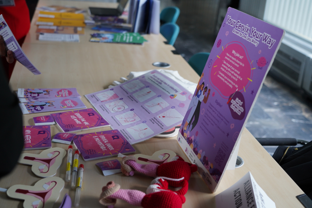 Educational toolkits and self-sampling guides combat cultural stigma by empowering women with direct health information.