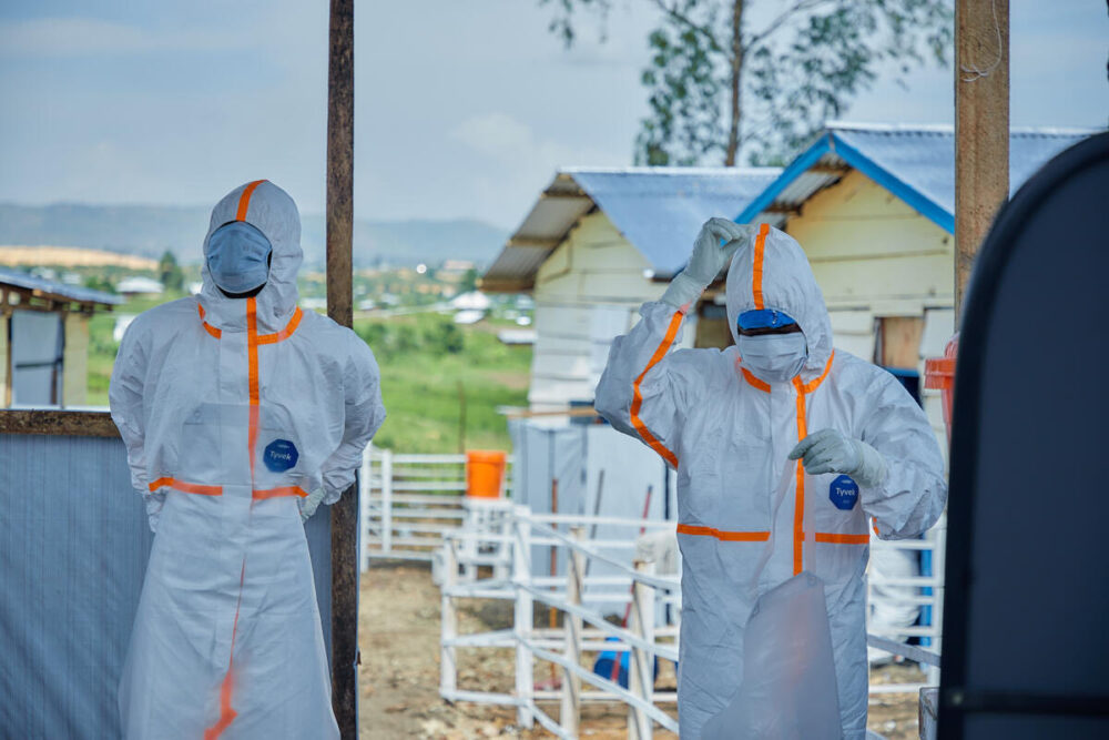 Frontline Ebola responders in the DRC. The ongoing crisis underscores the urgent imperative to close the gap between global donor pledges and resources reaching the ground.