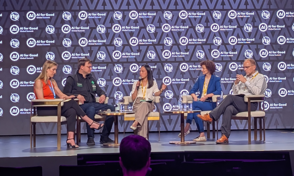 From left to right: Catherine Cheney (Devex), Alex Aliper (Insilico Medicine), Leslie Yeh (Google.org), Rita Rhayem (Gavi), and John Fairhurst (Global Fund) participate in a panel discussion at the AI for Good Global Summit in Geneva.