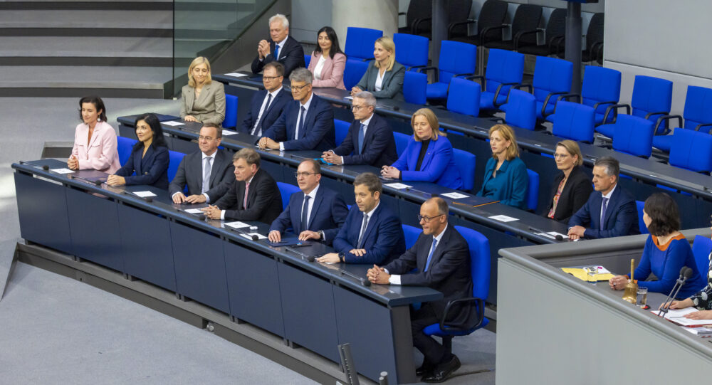 Chancellor Friedrich Merz (right) and Finance Minister Lars Klingbeil (second from right) prepare to present the new budget on 8 September.
