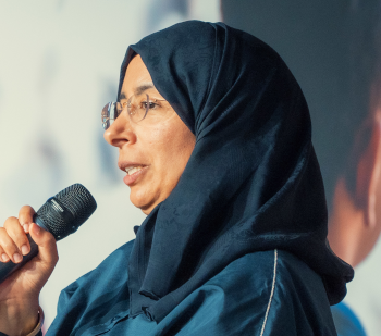 Dr Hanan Al Kuwari speaking at a WHO event.